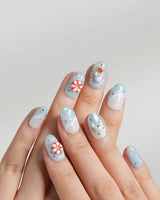 Baby Seals close-up of 3D seal nail art with watermelon and light blue water