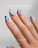 Bali Blue short almond nails with ocean blue jelly shine, 3D flowers, and starfish details