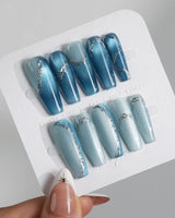 Banff Blue press-on nails in long coffin shape — Cat Eye Blue Nails with Chrome Outline