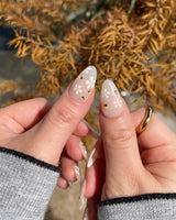 Beebee Nail Art nail art close-up showing Warm French, Daisy & Honeybee. details