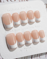 Belle Époque press-on nails in short square shape — classic French tip nails