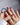 Berry me nail art close-up showing Rich Strawberry Red, 3D Strawberries & Pearls. details