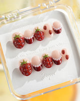 Berry me summer press-on nails with strawberry charms and soft nude polish