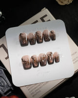 Black Briar handmade press-on nails in extra short coffin shape by Joyee Nails