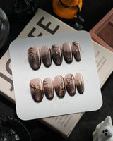 Black Briar handmade press-on nails in medium oval shape by Joyee Nails