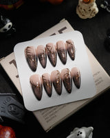 Black Briar handmade press-on nails in medium stiletto shape by Joyee Nails