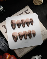 Black Briar handmade press-on nails in short stiletto shape by Joyee Nails