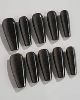 Black Cat-eye press-on nails in long coffin shape — black cat eye