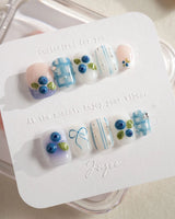 Blue Grid cool blueberry nail set with white plaid and glossy gel finish