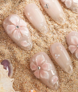 Blush Melt handmade press-on nails featuring Aurora Nude cat eye, 3D Sculpted Translucent Flowers.
