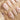 Blush Melt medium almond press-on nails with aurora nude cat-eye shimmer and translucent flowers