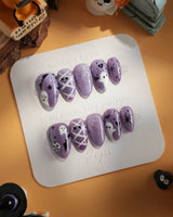 Boo Flicks -Purple press-on nails in extra short almond shape — Purple Glitter Halloween, Playful Ghost & Spiderweb.
