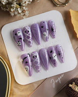 Boo Flicks -Purple press-on nails in medium stiletto shape — Purple Glitter Halloween, Playful Ghost & Spiderweb.
