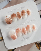 Brown & Khaki press-on nails in extra short oval with earthy neutral glossy finish