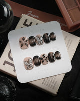 Butterfly Effect handmade press-on nails in extra short squoval shape by Joyee Nails