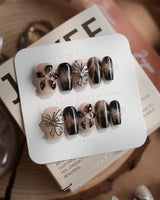 Butterfly Effect nails in short coffin — Neutral Nude & Black,