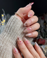 Candy Holiday press-on nails — Festive Christmas, Candy Canes & Gingerbread Man. handmade nail art by Joyee Nails