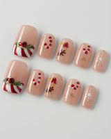 Candy Holiday press-on nails in short square shape — Festive Christmas, Candy Canes & Gingerbread Man.