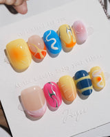 Candy Pop Colored press-on nails in extra short oval shape — gradient multicolor abstract gloss nails