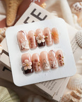 Caramel Cream in medium square shape with warm brown flowers and gold wire details