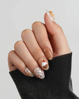Caramel Miffy glossy bunny nail art in warm brown, cream, and gold tones