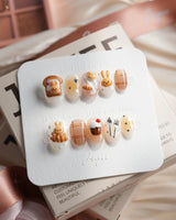 Caramel Miffy bunny dessert press-on nails in extra short oval shape