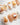 Caramel Miffy short oval nails with 3D bunny, toast, cupcakes, and warm caramel tones