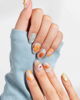Caramel Toast custom press-on nails with warm bakery tones and ice cream cone accents