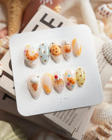 Caramel Toast bakery press-on nails in extra short almond shape