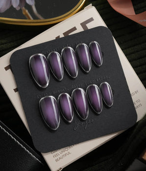 Cassis press on nails in deep blackcurrant purple glossy jelly with a hand-drawn silver chrome outline - image 1
