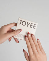 Bow French press-on nails — nude base red chrome french gold outline bow accent handmade nail art by Joyee Nails