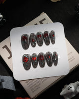 Cathedral Rose handmade press-on nails in medium oval shape by Joyee Nails