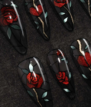 Cathedral Rose gothic press on nails with red glitter roses, hearts and mint leaves in black stained glass lines on a smoky sheer base - image 1