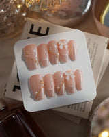 Champagne Veil nails in medium coffin — Soft Nude Pink, Shimmering