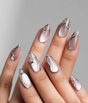 Chrome lines handmade press-on nails featuring Cool-toned Silver Grey Cat Eye, Liquid Metal Lines & 3D Heart.