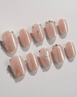 Chrome Wings press-on nails in extra short oval shape — chrome Icy Pink, Sparkling Rhinestone Fireworks.