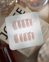 Chrome Wings press-on nails in short coffin shape — chrome Icy Pink, Sparkling Rhinestone Fireworks.