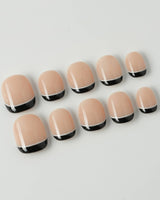 Classic Return - Ebony in extra short squoval shape with black French tips and white accents