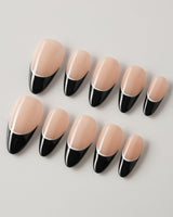 Classic Return - Ebony in medium almond shape with black French tips and white line art