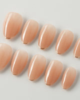Clean Grace press-on nails in extra short almond shape — gold french tip nails