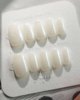 Clean Pearl press-on nails in short square shape — white chrome nails