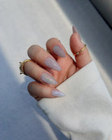 Clean Rainbow Cat-eye handmade press-on nails featuring pale pink cat eye nails