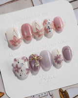 Clematis-Visionaria press-on nails in extra short oval shape — Elegant Taro Purple, Hand-painted Clematis & Delicate Bow.