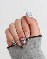Cocoa Dot short almond nail art with structured stripes and polka dot layout