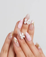 Coquette Garden press-on nails in short almond shape — Gentle Pink Gradient, 3D White Bows & Hand-painted Tulips.