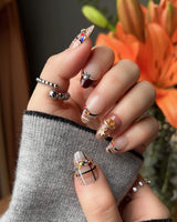 Cozy Plaid handmade press-on nails featuring British Plaid, Colorful Rhinestone & Planet Charm.
