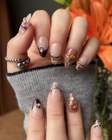 Cozy Plaid nail art close-up showing British Plaid, Colorful Rhinestone & Planet Charm. details