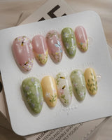 Cream Garden press-on nails in medium almond shape — Pastoral Style, Hand-painted Bees & Wildflowers.