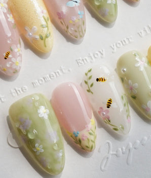Cream Garden handmade press-on nails featuring Pastoral Style, Hand-painted Bees & Wildflowers.