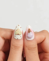 Cream Scoop close-up of gold heart cookie and ice cream cone nail details